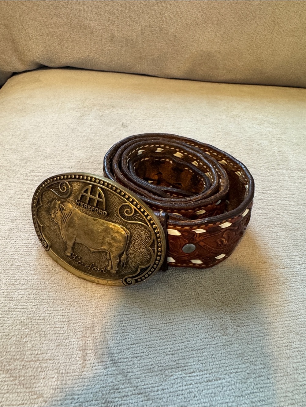 Adult brass belt buckle. Tony lama brand.  Chi bull design. Vintage with belt